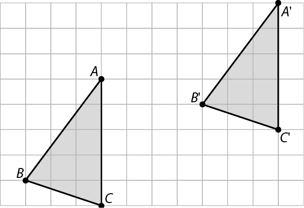 Gráfico. Malha quadriculada com triângulo ABC cinza no canto inferior esquerdo. No canto superior direito, triângulo A linha B linha e C linha, cinza. Os dois triângulos são iguais.
