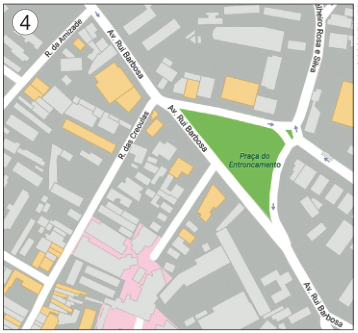 Imagem: Ilustração 4. Vista de cima de um mapa. No centro há uma praça verde e em volta, quarteirões cinza e ruas em branco. Fim da imagem.