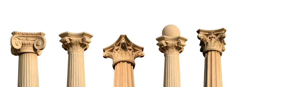 Imagem: Fotografia. Colunas cilíndricas com bases em esculturas formando arabescos.     Fim da imagem.