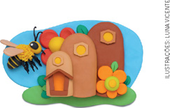 IMAGEM: abelha sobrevoa ao lado de sua casa, de três telhas lado a lado. as janelas são hexágonos de colmeias. há duas flores próximas à casa. todos os elementos são feitos de massa de modelar. FIM DA IMAGEM.