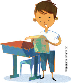 IMAGEM: um menino em pé ao lado de uma carteira escolar lê uma folha de papel, alegremente. FIM DA IMAGEM.