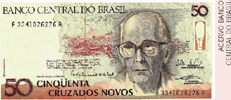 IMAGEM: reprodução de uma nota de cinquenta cruzados novos do banco central do brasil. nela, o rosto de carlos drummond de andrade, um senhor calvo e com óculos. FIM DA IMAGEM.