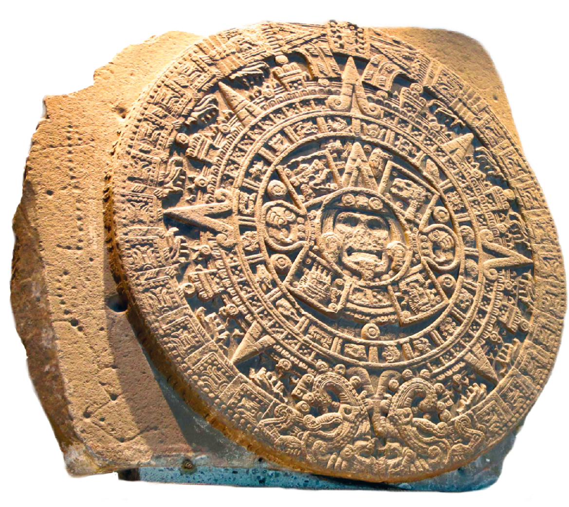 Fotografia. Destaque para um calendário entalhado em pedra, contendo escritas e símbolos, dispostos de forma simétrica em um círculo, com a representação de um rosto, caracterizando o deus-sol, ao centro.