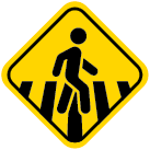Ícone. Seção Cruzando saberes. Composto por uma placa amarela com a silhueta de uma pessoa atravessando na faixa de pedestres.