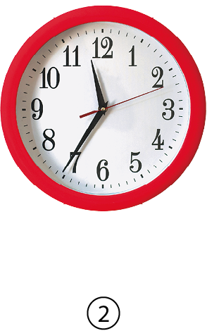 Fotografia. Relógio redondo com o ponteiro menor entre 11 e 12 e maior no 7. Ponteiro dos segundos entre o 2 e 3. Esse relógio é nomeado de 2.
