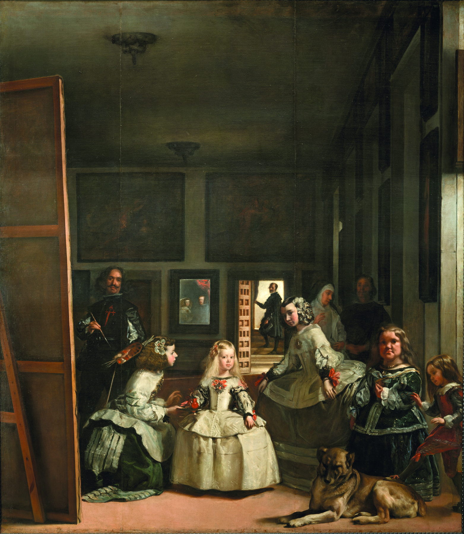 Pintura. Las meninas, de Diego Velázquez. À esquerda há um homem de roupa preta de frente para um quadro de madeira segurando um pincel. À direita, uma mulher de cabelo castanho, usando vestido bufante, está ajoelhada e segurando a mão de uma menina pequena de cabelo loiro e comprido, usando um vestido branco bufante com detalhes vermelhos. A menina está em pé e com a mão direita esticada para frente, segurando a mão da mulher. À direita há outras três meninas, todas com vestidos bufantes. A que está mais à direita está com um pé apoiado em um cachorro que está deitado no chão. Atrás das meninas há dois adultos observando a cena. Ao fundo, há uma porta entreaberta atrás da qual há um homem com vestimentas pretas. Ao redor da sala há diversos quadros pendurados nas paredes.