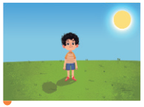 IMAGEM: vinícius está em um gramado verde. o sol está à sua direita e sua sombra é projetada para a sua esquerda. FIM DA IMAGEM.