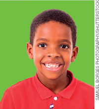 IMAGEM: um menino negro com cabelo crespo e curto. FIM DA IMAGEM.