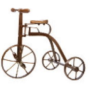 IMAGEM: triciclo antigo feito de ferro. FIM DA IMAGEM.