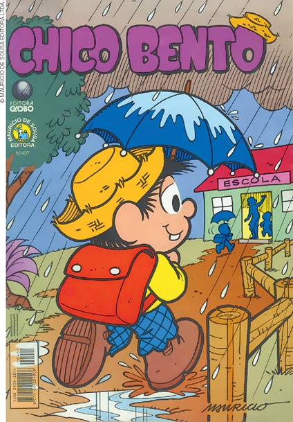 IMAGEM: capa do gibi do Chico bento que mostra o personagem andando em direção à escola. ele se protege da chuva com um guarda-chuva. Chico bento é um menino dentuço, que usa calças xadrez, camiseta, botas, mochila e chapéu de palha. FIM DA IMAGEM.