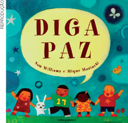IMAGEM: capa do livro diga paz ilustrada com quatro crianças de mãos dadas com um coelhinho. FIM DA IMAGEM.