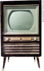IMAGEM: um aparelho de televisão antigo. o monitor está embutido em um móvel de madeira com quatro pés. abaixo da tela, botões e saída de som. FIM DA IMAGEM.