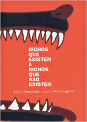 Imagem: Capa de livro. No centro, o título e o nome do autor. Em volta, ilustração da boca aberta de um animal com dentes afiados. Fim da imagem.