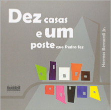 Imagem: Capa de livro. Na parte superior, o título e o nome do autor. Na parte inferior, retângulos coloridos.  Fim da imagem.