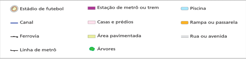 Imagem: Mapa. Planta de uma cidade com legenda na parte inferior indicando as construções. No centro, um estádio de futebol. Ao redor há entradas que são rampas ou passarelas e várias árvores es-palhadas. Para a direita do estádio tem uma piscina. Ao redor de todas essas construções há ruas ou avenidas contornando quadras de casas e prédios. Na parte superior do mapa há ferrovias e linhas de metro. Fim da imagem.