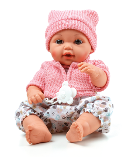Imagem: Fotografia. Uma boneca semelhante a um bebê sentado. Fim da imagem.