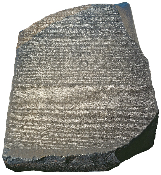 Imagem: Fotografia. Uma pedra cinza em formato retangular com bordas irregulares e superfície cheia de inscrições. Fim da imagem.