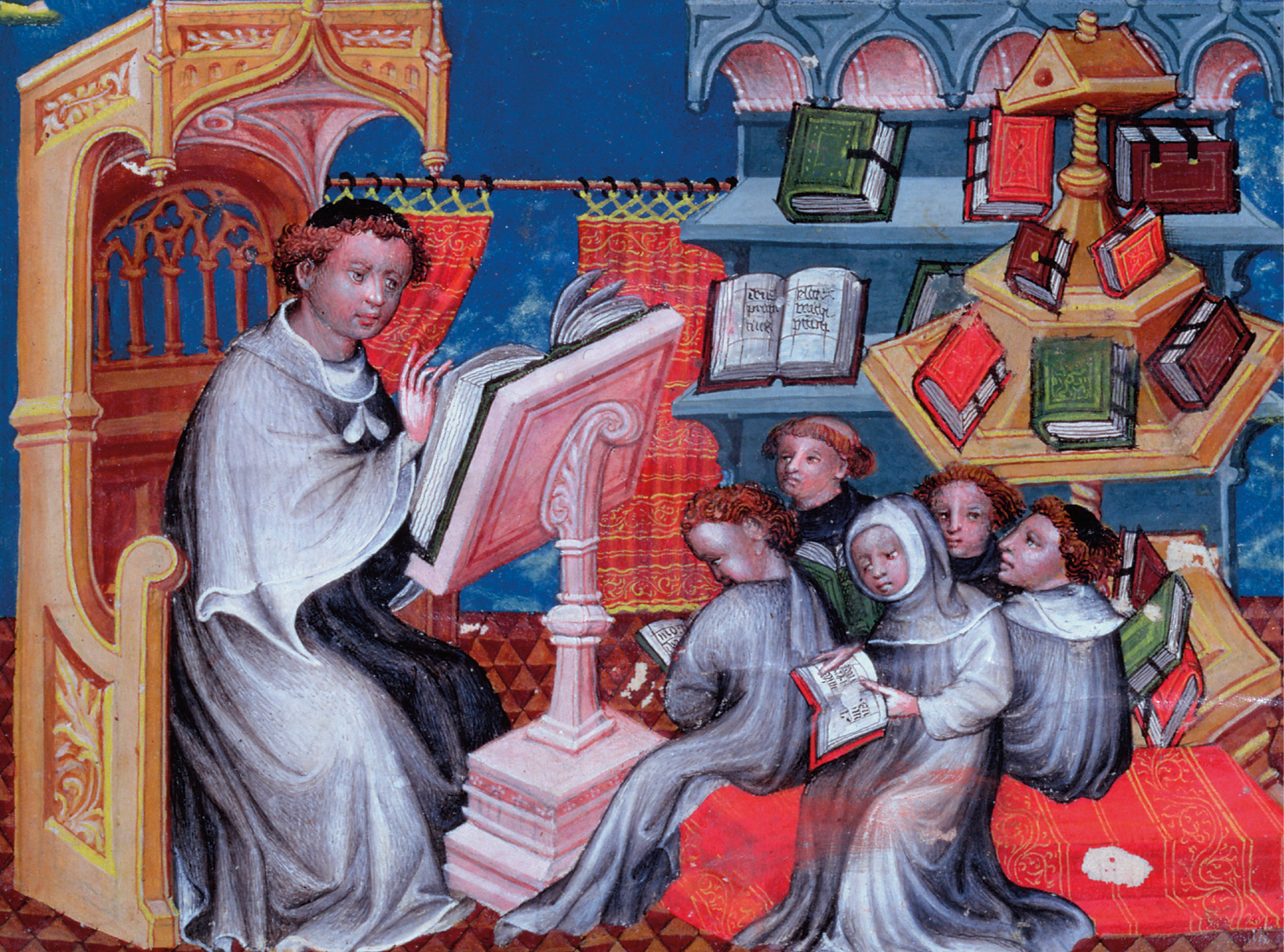Iluminura. À esquerda, homem de vestes largas, está sentado em uma cadeira à frente de um grande livro aberto. Próximo a ele, sentadas à direita, crianças com livros nas mãos. Ao fundo, estantes com livros.