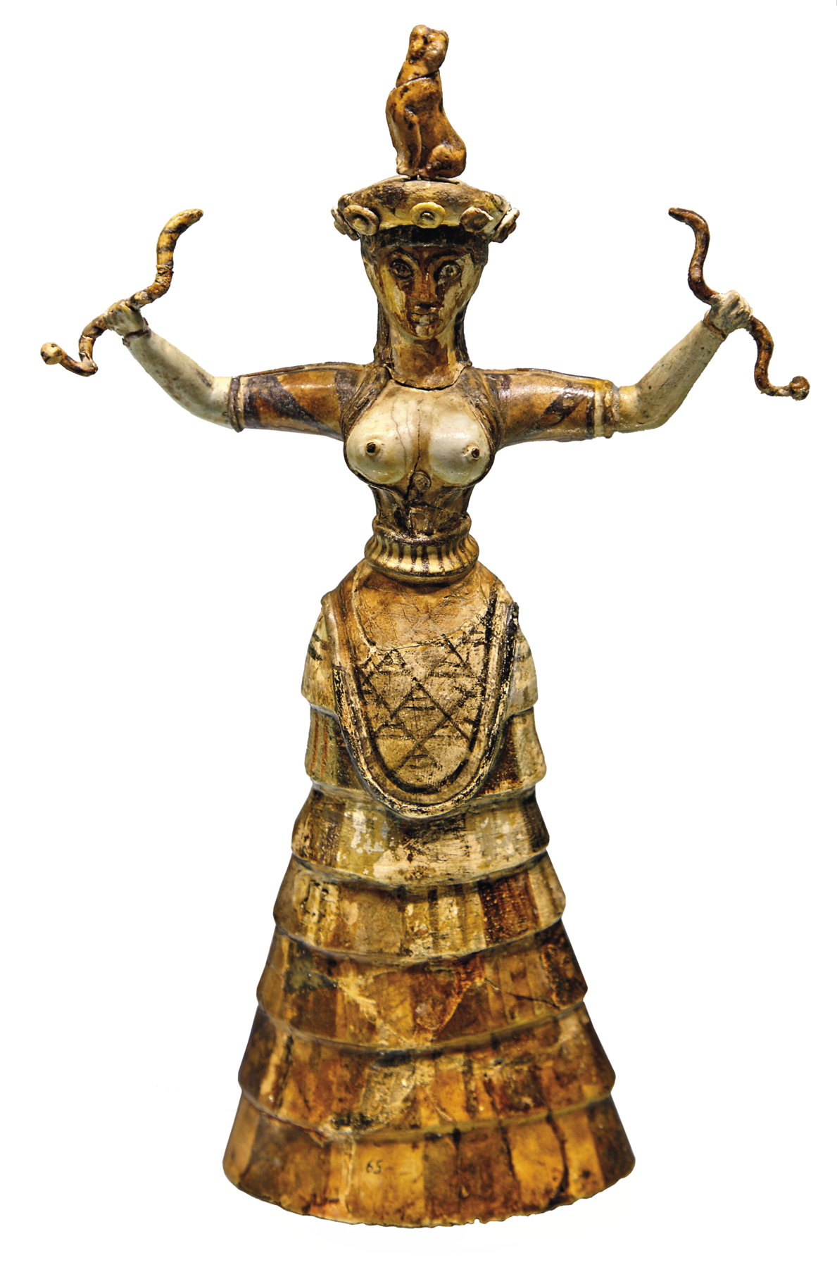 Escultura. Estatueta dourada de uma mulher. Ela está com os seios à mostra e veste uma longa saia rodada. Está com os braços esticados para os lados. Em cada uma das mãos ela segura uma serpente.