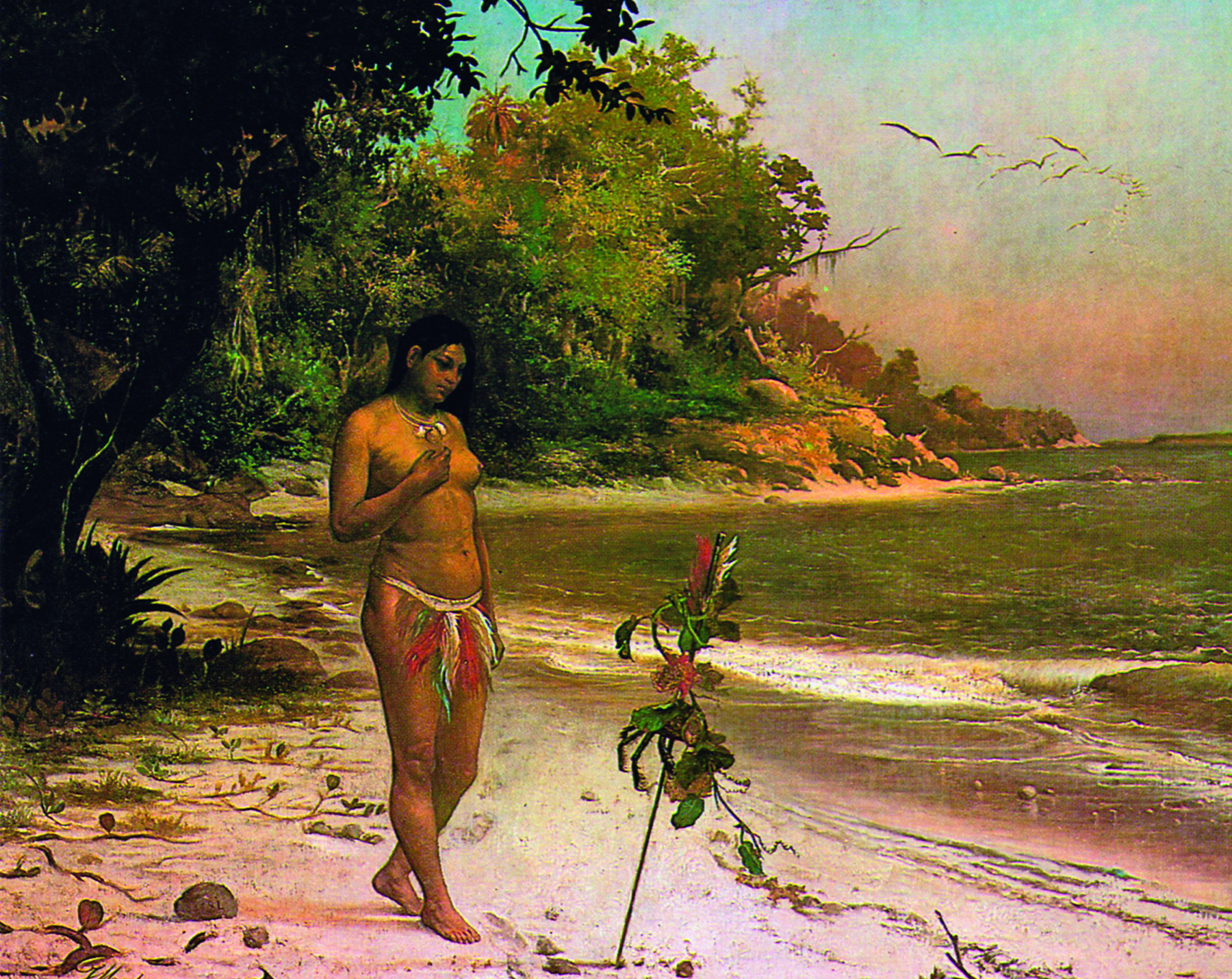 Pintura. Mulher indígena na praia. Ela está em pé, cobrindo um dos seios com a mão. A parte de baixo está coberta por um enfeite de penas coloridas. Tem o cabelo longo e escuro caído de lado. Ao redor dela muitas árvores e o mar.