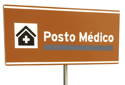 Ilustração quatro. Placa com ícone prédio com telhado triângulo e texto: Posto Médico.