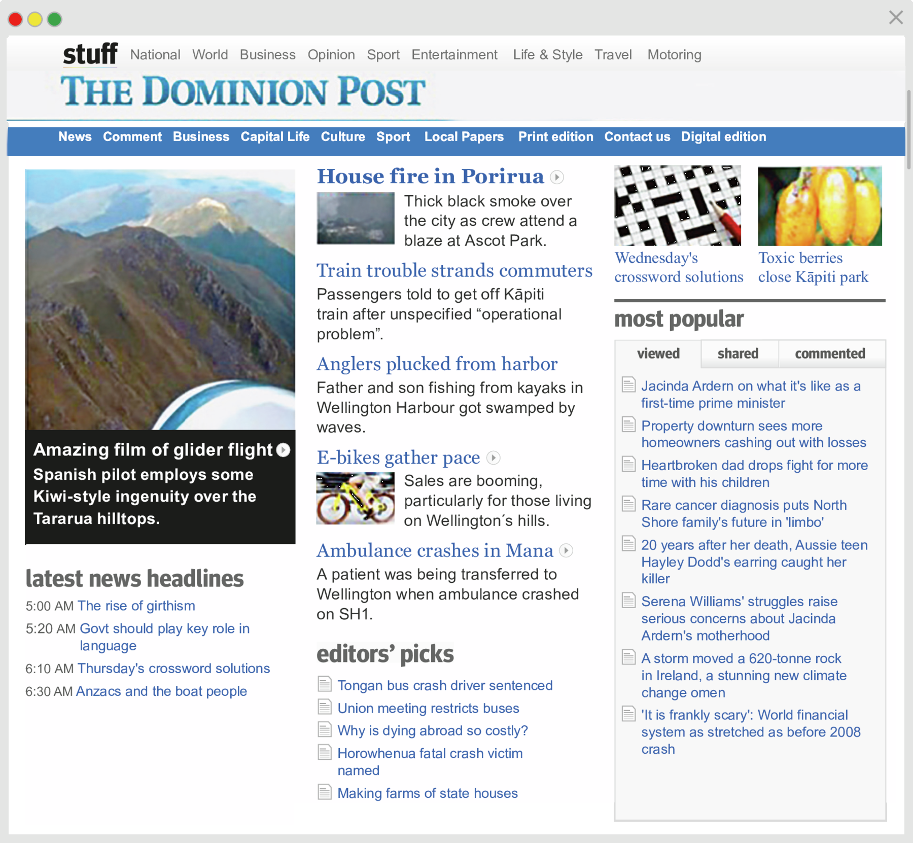 Reprodução de página de internet. Jornal online. Na parte superior do texto, texto: stuff. Menus: National, World, Business, Opinion, Sport, Entertainment, Life AND Style, Travel e Motoring. Título: The Dominion Post. Mais abaixo, outros menus: News, Comment, Business, Capital Life, Culture, Sport, Local Papers, Print edition, Contact us, Digital edition. Na parte inferior, à esquerda, fotografia de local aberto, com morros marrons, céu azul e texto: Amazing film of glider flight Spanish pilot employs some Kiwi-style ingenuity over the Tararua hilltops. Na parte inferior, à esquerda, texto: latest news headlines. Five AM, The rise of girthism. Five twenty AM, Government should play key role in language. Six ten AM, Thursday's crossword solutions. Six thirty AM, Anzacs and the boat people. Ao centro, texto: House fire in Porirua, Thick black smoke over the city as crew attend a blaze at Ascot Park. Train trouble strands commuters. Passengers told to get off Kāpiti train after unspecified operational problem. Anglers plucked from harbor. Father and son fishing from kayaks in Wellington Harbour got swamped by waves. E-bikes gather pace. Sales are booming, particularly for those living on Wellington´s hills. Ambulance crashes in Mana. A patient was being transferred to Wellington when ambulance crashed on SH one. Editors' picks. Tongan bus crash driver sentenced. Union meeting restricts buses. Why is dying abroad so costly? Horowhenua fatal crash victim named. Making farms of state houses. No canto superior direito, fotografia de uma folha de um jogo de palavras cruzadas com ponta de lápis vermelho no canto inferior esquerdo. Texto: Wednesday's crossword solutions. Ao lado, há outra fotografia. Frutos de tamanho médio em amarelo. Texto: Toxic berries close Kāpiti park.Abaixo das fotos, outros links para matérias com os seguintes textos: most popular. viewed, shared, commented. Jacinda Ardern on what it's like as a first-time prime minister. Property downturn sees more homeowners cashing out with losses. Heartbroken dad drops fight for more time with his children. Rare cancer diagnosis puts North. Shore family's future in 'limbo' twenty years after her death, Aussie teen Hayley Dodd's earring caught her killer. Serena Williams' struggles raise serious concerns about Jacinda Ardern's motherhood. A storm moved a six hundred and twenty tonne rock in Ireland, a stunning new climate change omen. It is frankly scary: World financial system as stretched as before two thousand and eight crash.