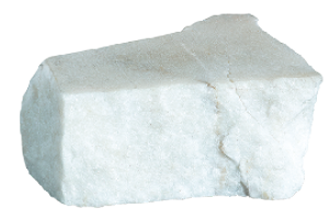 Fotografia. Pedaço de rocha branca e com superfície regular.