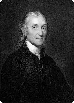 Pintura. Retrato de Joseph Priestley, em preto e branco. Ele está representado da cintura para cima e seu rosto está levemente virado para a direita. Ele tem cabelos brancos que chegam até o pescoço e está vestindo uma roupa escura com um lenço claro no pescoço.