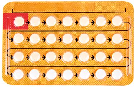 Fotografia. Uma cartela com vinte e oito comprimidos, entre os quais há setas. O primeiro comprimido está com a cartela marcada com a cor vermelha.