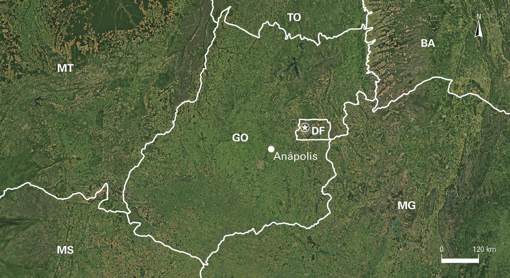 Fotografia D. Imagem de satélite. Destaque para o estado de Goiás com um ponto indicando Anápolis ao sul do Distrito Federal. No canto superior direito, seta apontando para o norte e abaixo, a escala: 120 quilômetros por centímetro.