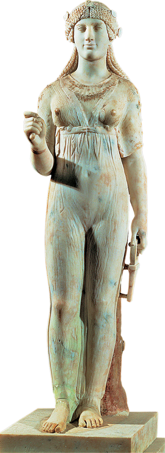 Escultura. Figura humana feminina com adorno nos cabelos, usando um vestido que deixa as formas do corpo expostas. Ela está de pé, com a braço direito levando e a mão esquerda segurando um objeto próximo à perna.