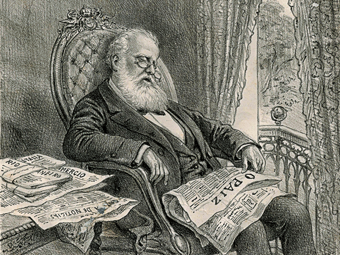 Charge. Um homem com cabelos e barba branca, usando óculos e terno, está sentado em uma poltrona com os olhos fechados. No colo, há um jornal com o texto: O PAIZ.