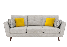 Fotografia de um sofá de 3 lugares, cinza, com almofadas cinzas e amarelas.
