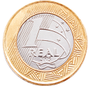 Fotografia de uma moeda de 1 real na face coroa. Está escrito '1 real'.