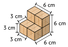 Ilustração de uma pilha de cubos de madeira, formada por 6 cubos, sendo uma base com 4 cubos com 2 em cima, com a pilha lembrando o formato da letra L. Está indicado que cada cubo tem arestas medindo 3 centímetros e a altura da pilha e seu comprimento tem 6 centímetros.