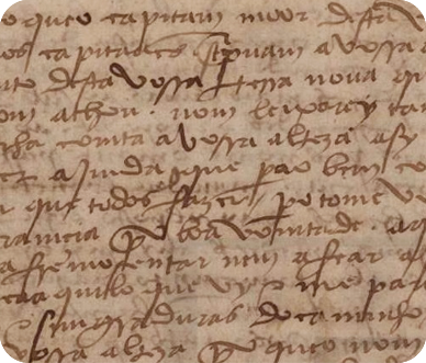 Fotografia. Folha de papel cor bege-claro com texto manuscrito em letra escura cursiva, em português antigo.