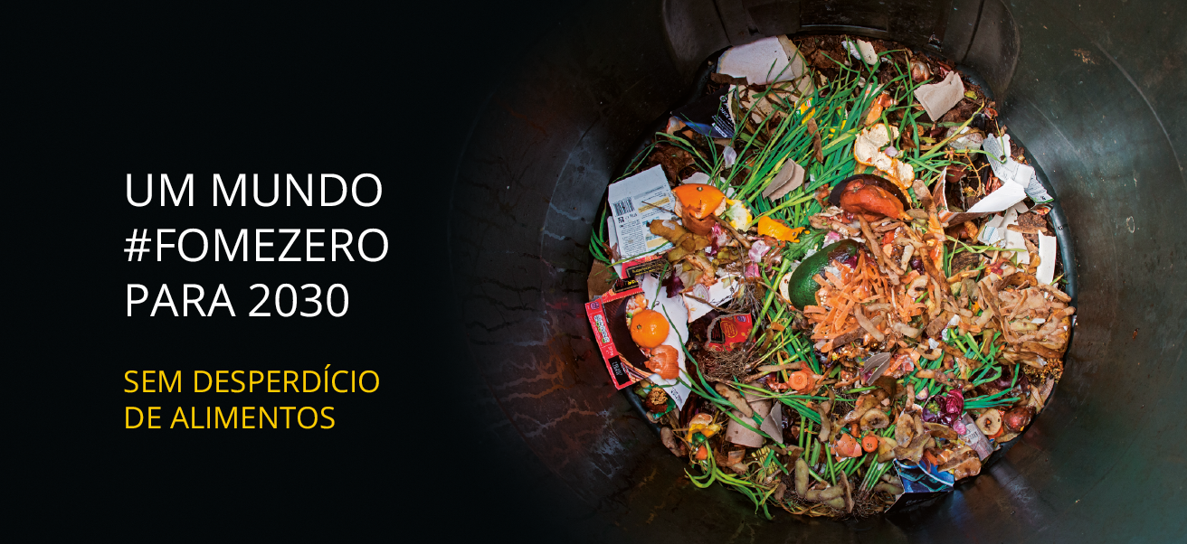 Cartaz na horizontal em preto. À direita, um círculo por onde veem-se restos de comida e vegetais, um sobre o outro. À esquerda, texto: UM MUNDO #FOMEZERO PARA 2030 – sem desperdício de alimentos.