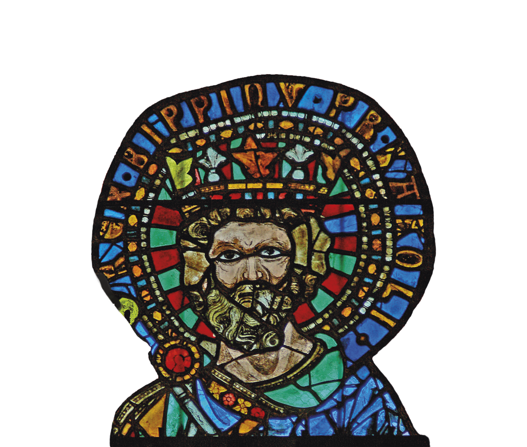 Vitral. Mosaico colorido do busto de um homem com barba, usando uma coroa e um manto. Atrás dele, um círculo com escritas na borda.