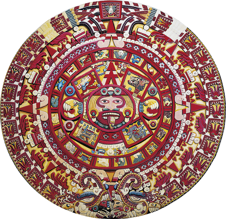 Fotografia. Artefato em círculo com desenhos e inscrições astecas em vermelho e amarelo. No centro, imagem similar a um rosto humano com olhos saltados e boca aberta.