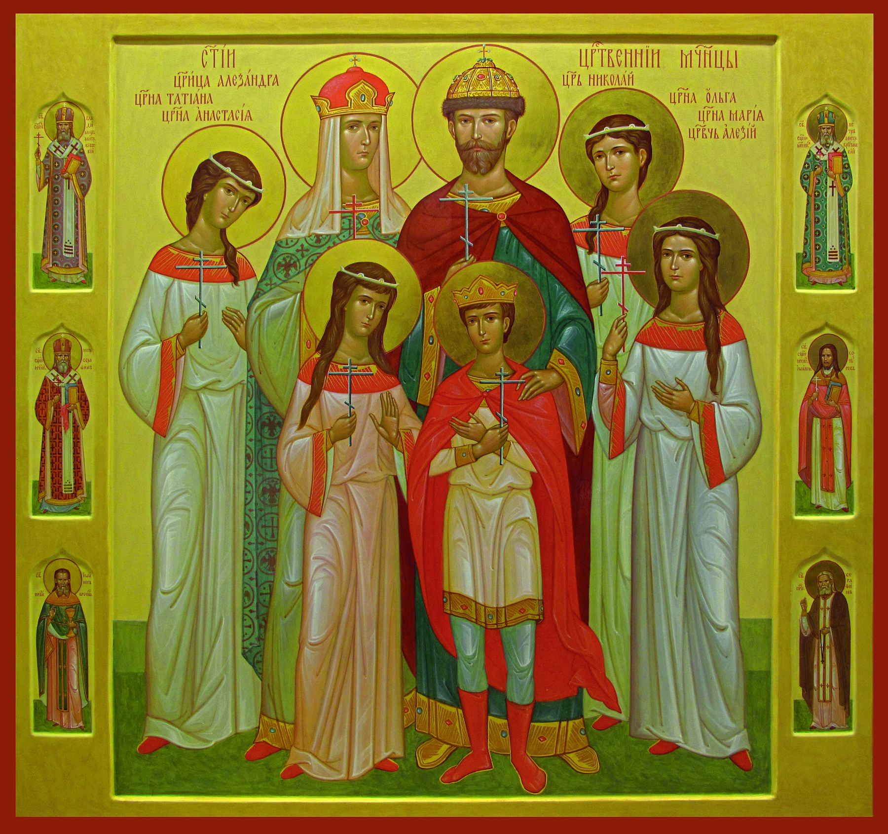Pintura. Nicolau II de coroa e manto vermelho em pé. Ao redor dele sua mulher, quatro filhas e um filho. Todos têm uma auréola atrás da cabeça.